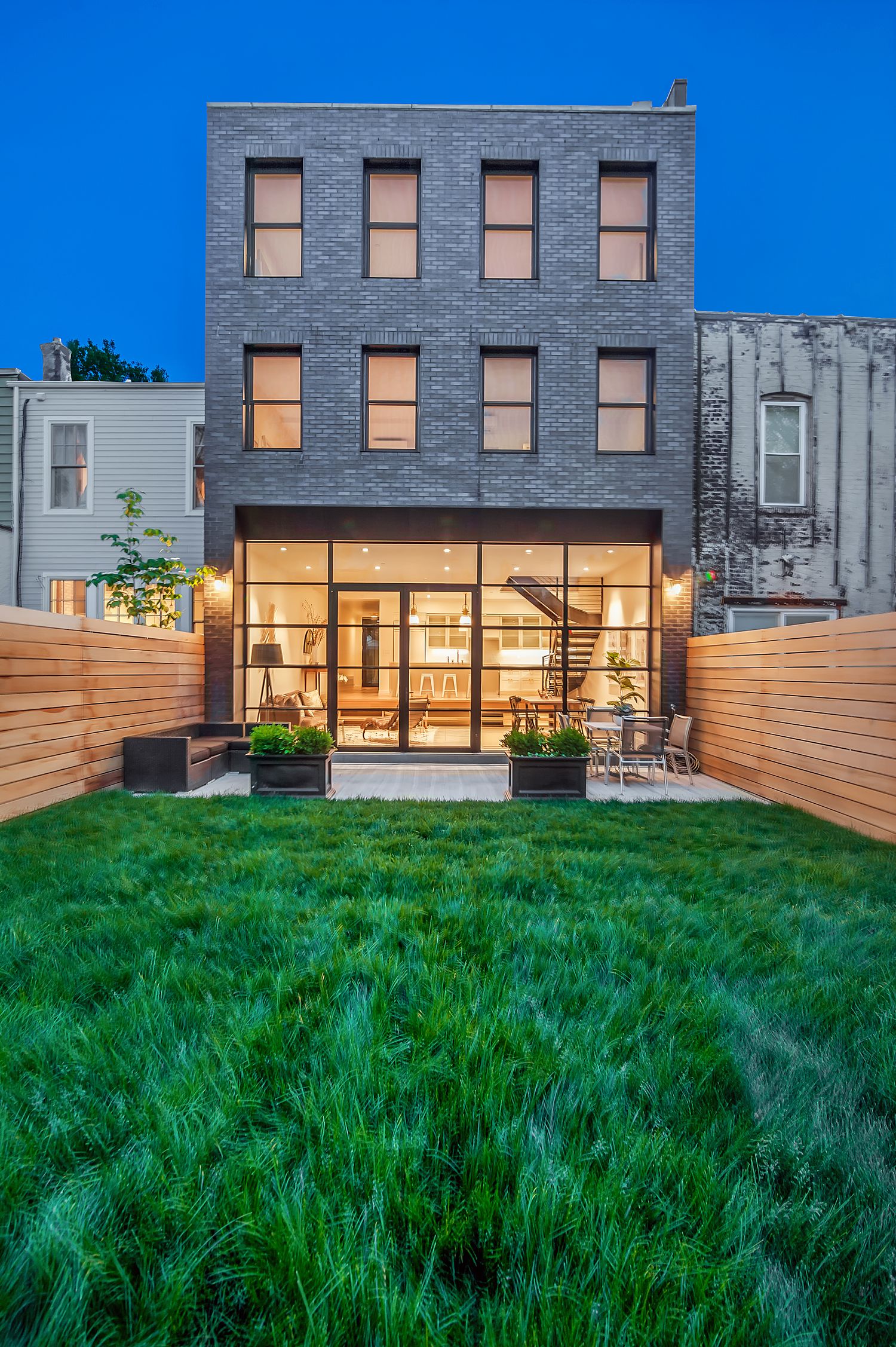 Rear facade at dusk, Park Slope